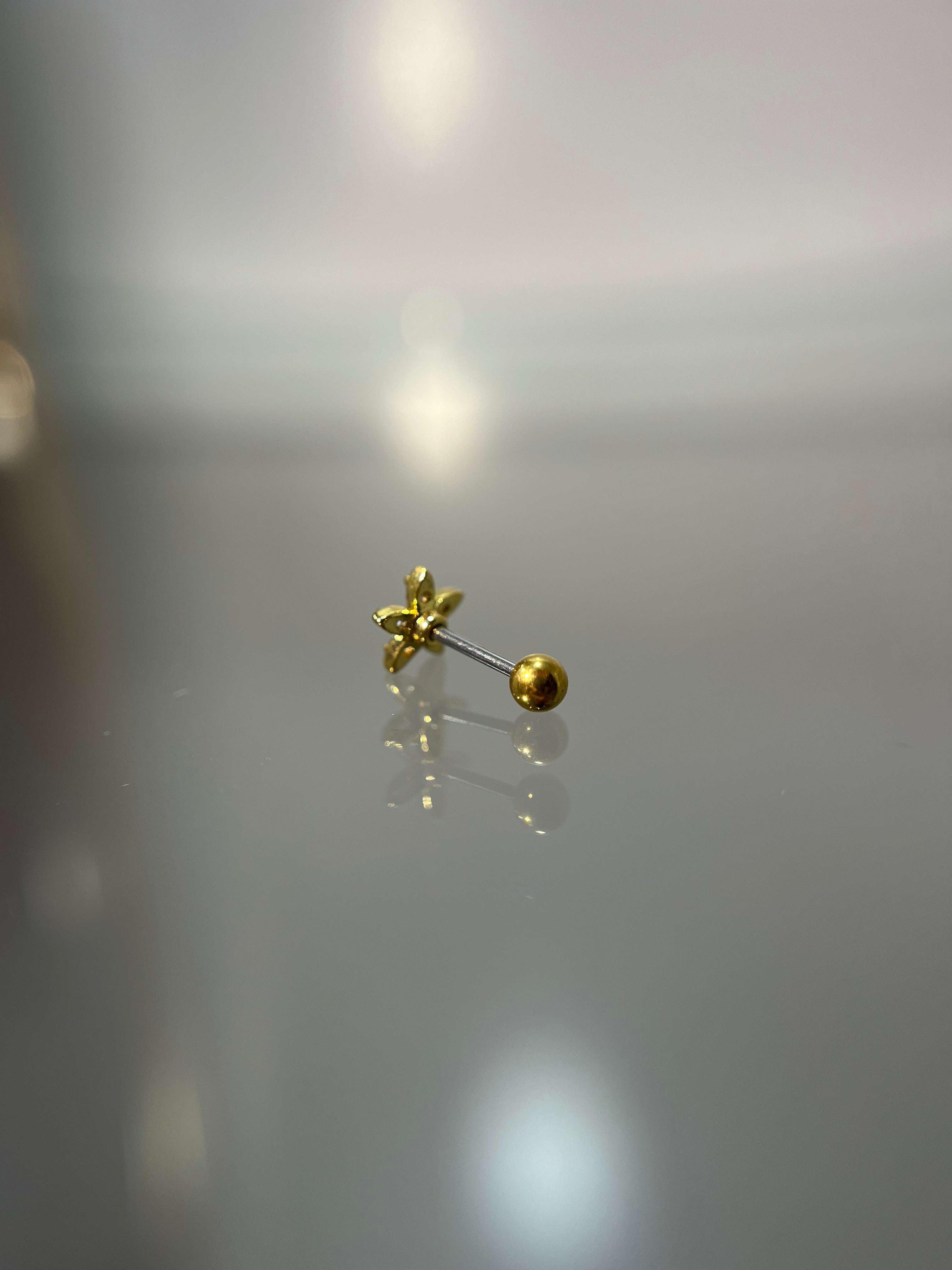 Piercings flor (cierre esfera)