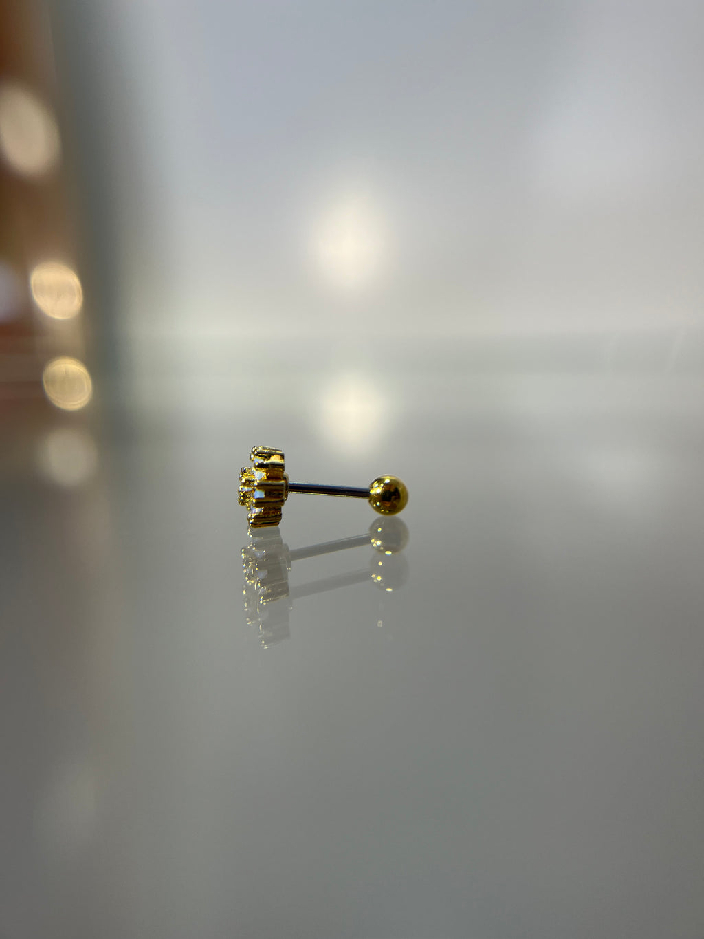 Piercings flor tornasol (cierre esfera)