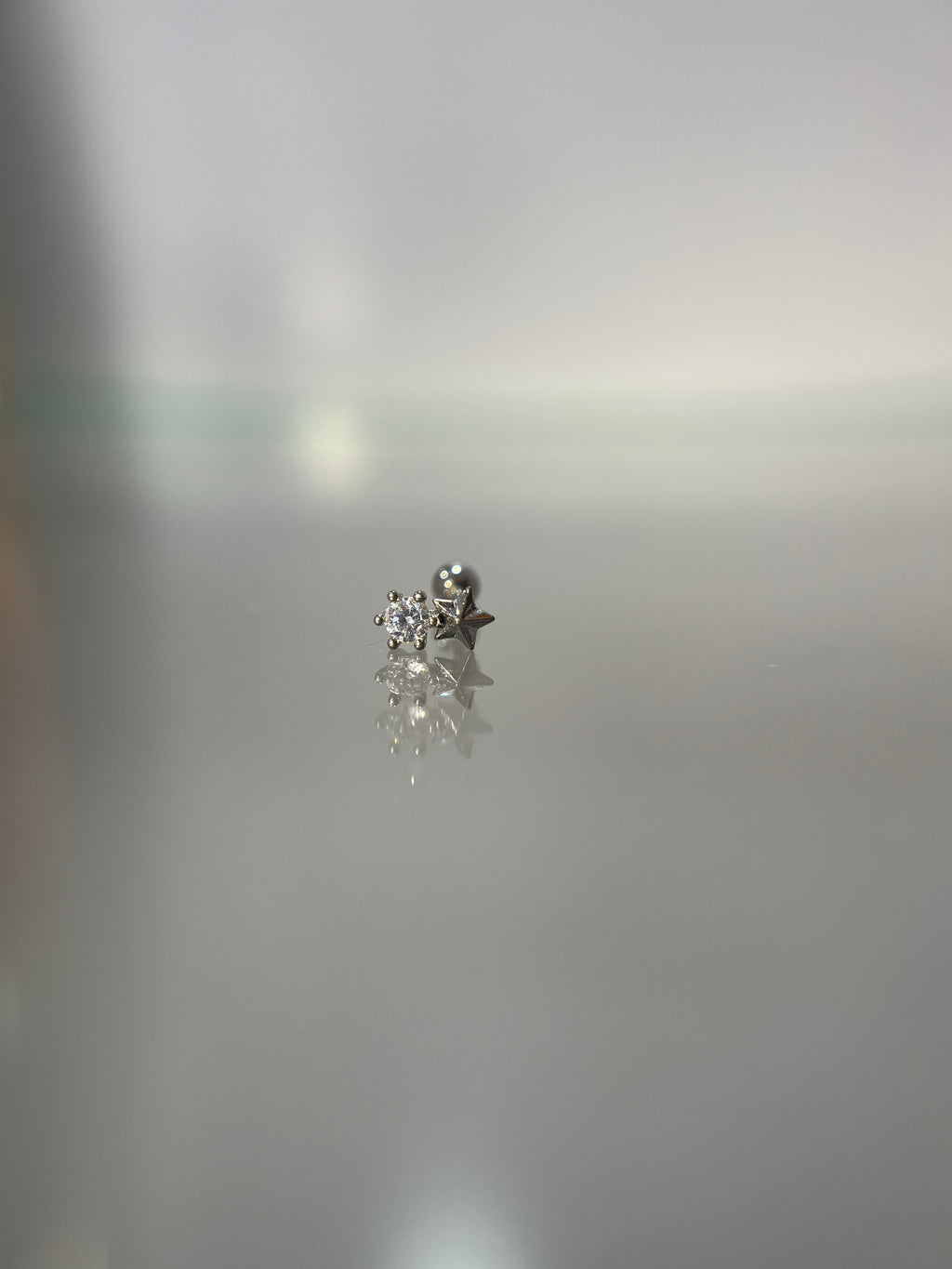 Piercings estrella (cierre esfera)