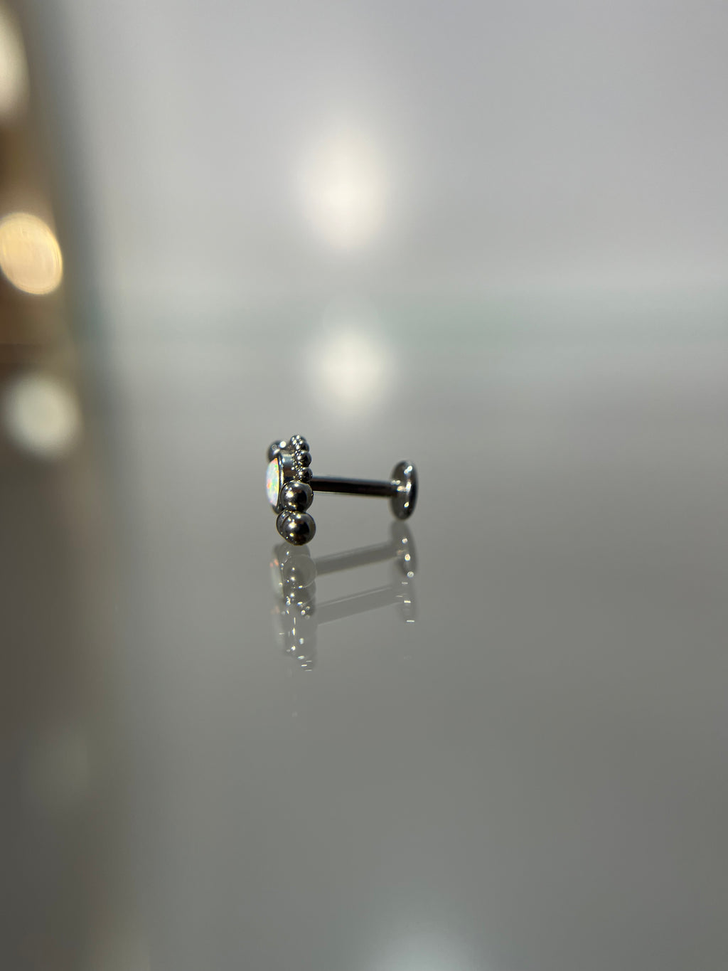 Piercings tornasol (cierre plano)