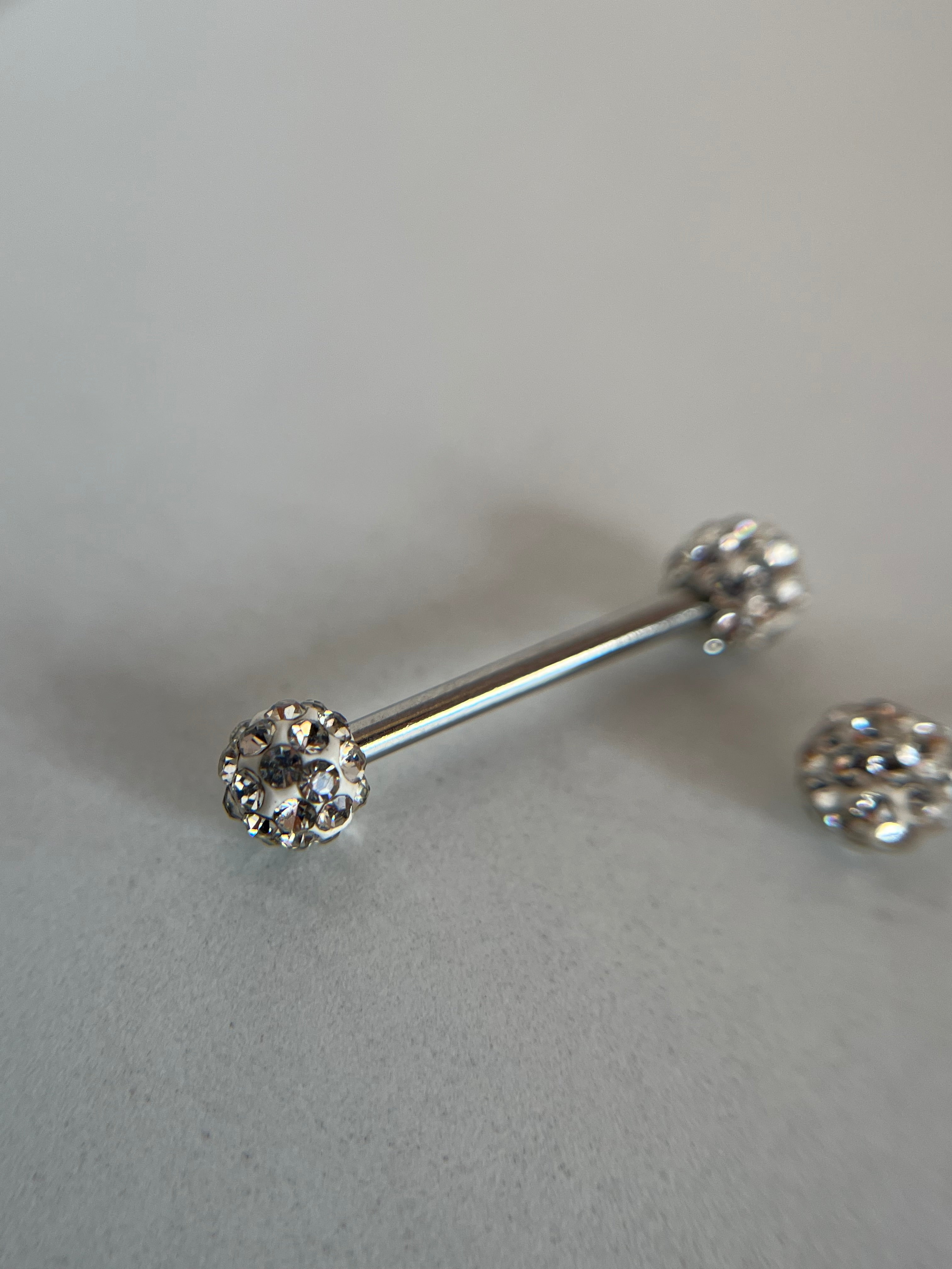 Piercings pezones esfera con cristal incrustado