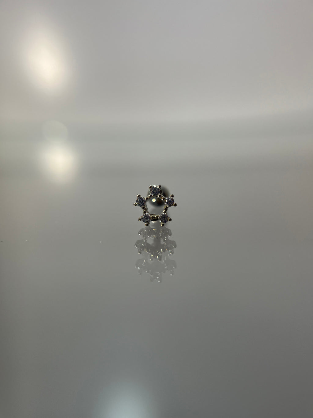 Piercings estrella (cierre esfera)