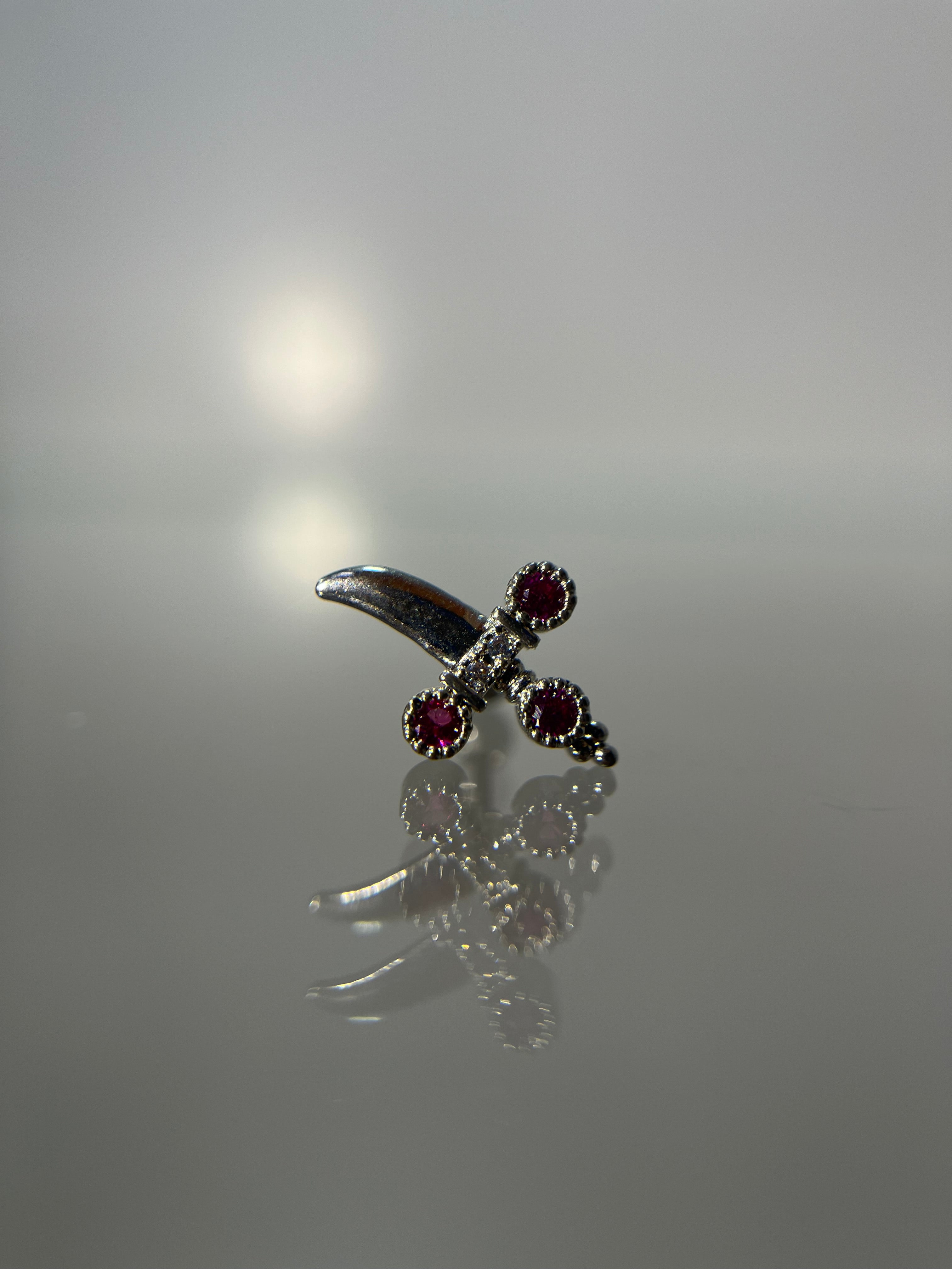 Piercings espada (cierre esfera)