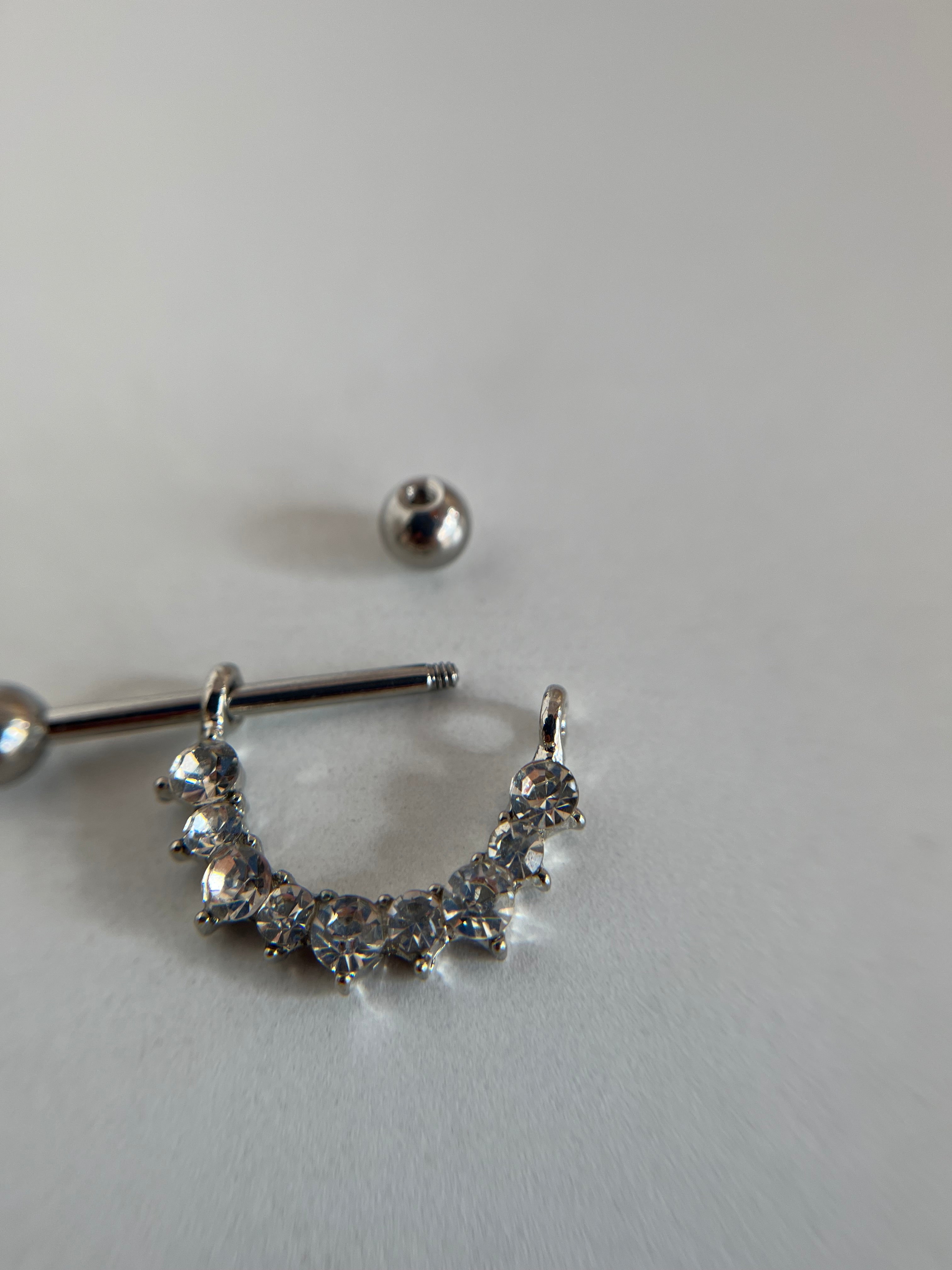 Piercings pezones diamantes
