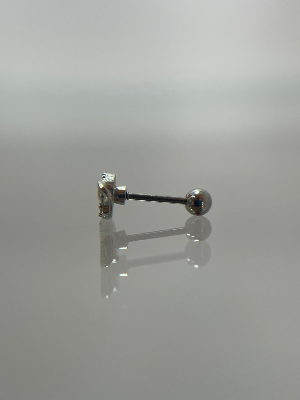 Piercing planeta acero plateado (cierre bolilla )