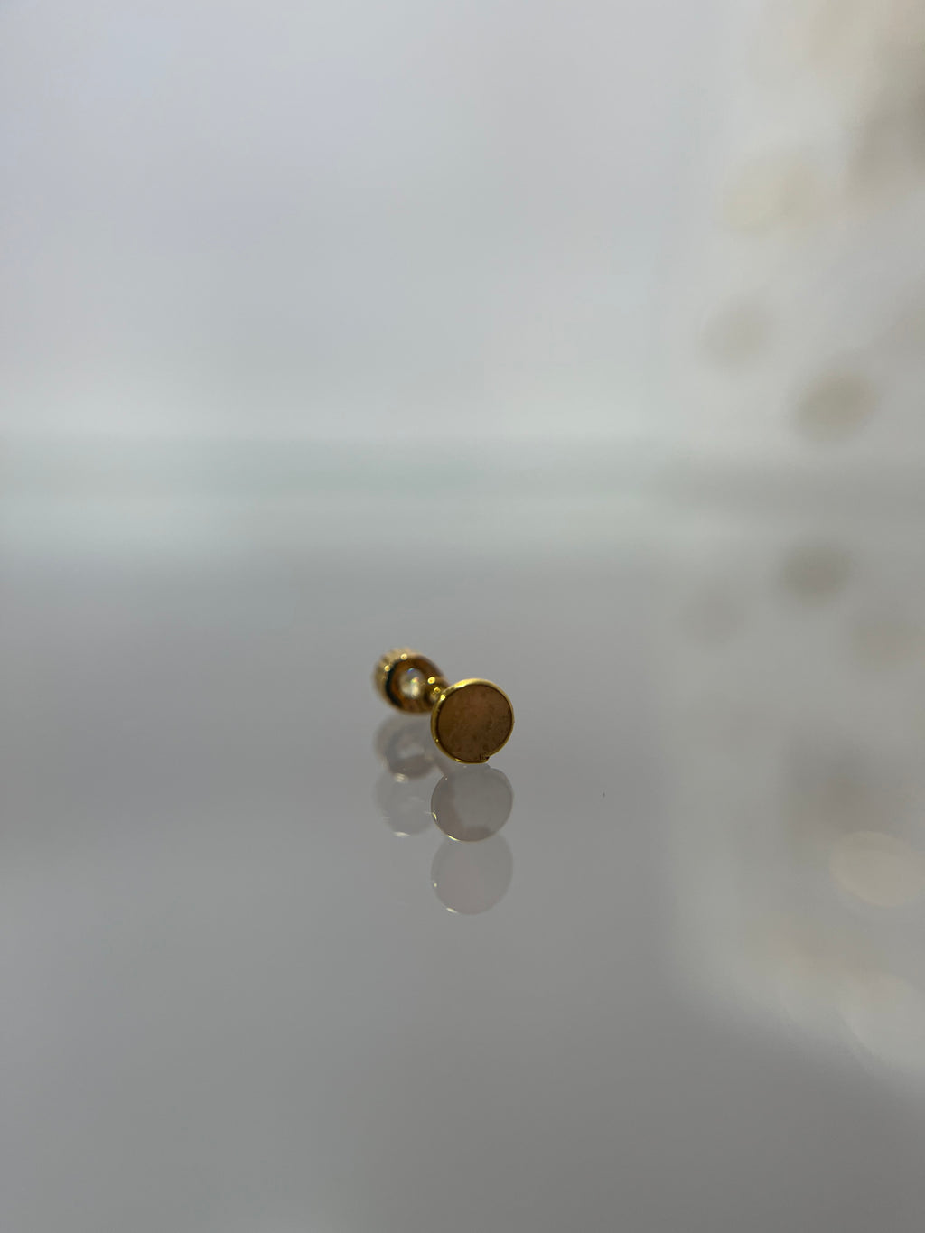 Piercings gota (cierre plano)
