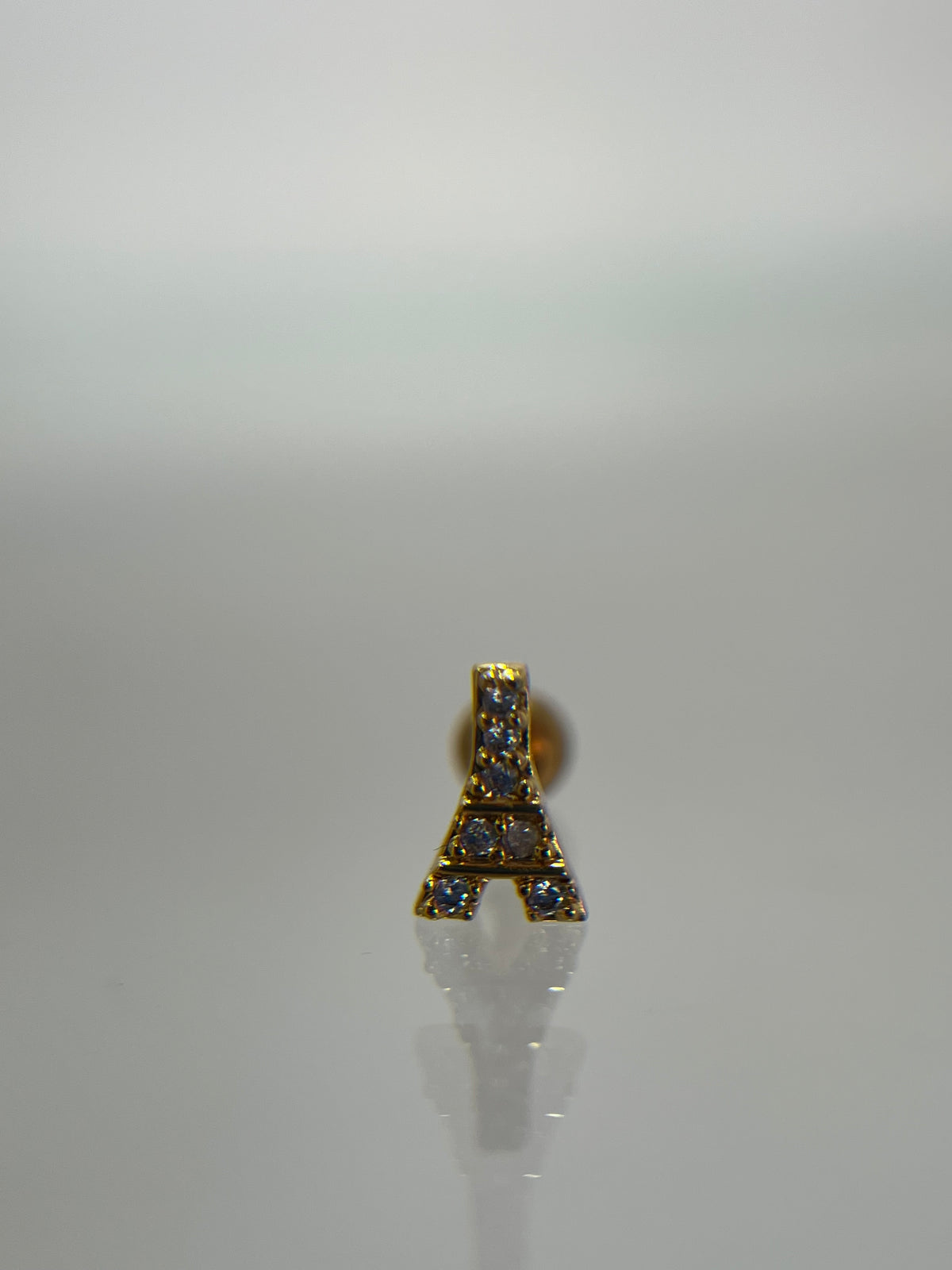 Piercing torre Eiffel titanium dorado (cierre bolilla)