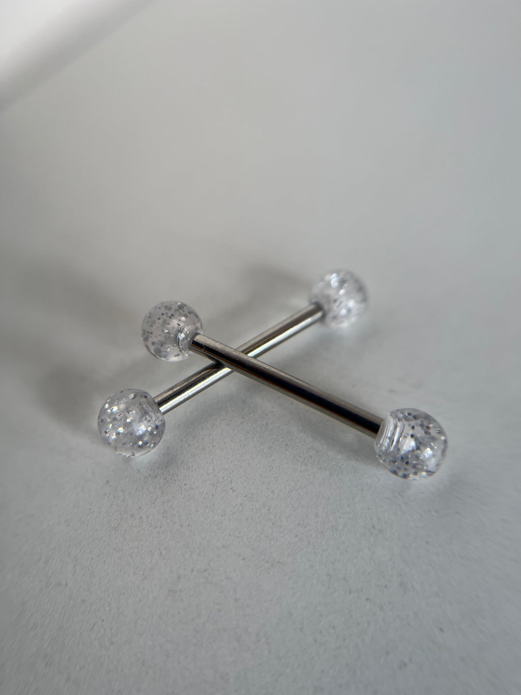 Piercings pezones esfera transparente