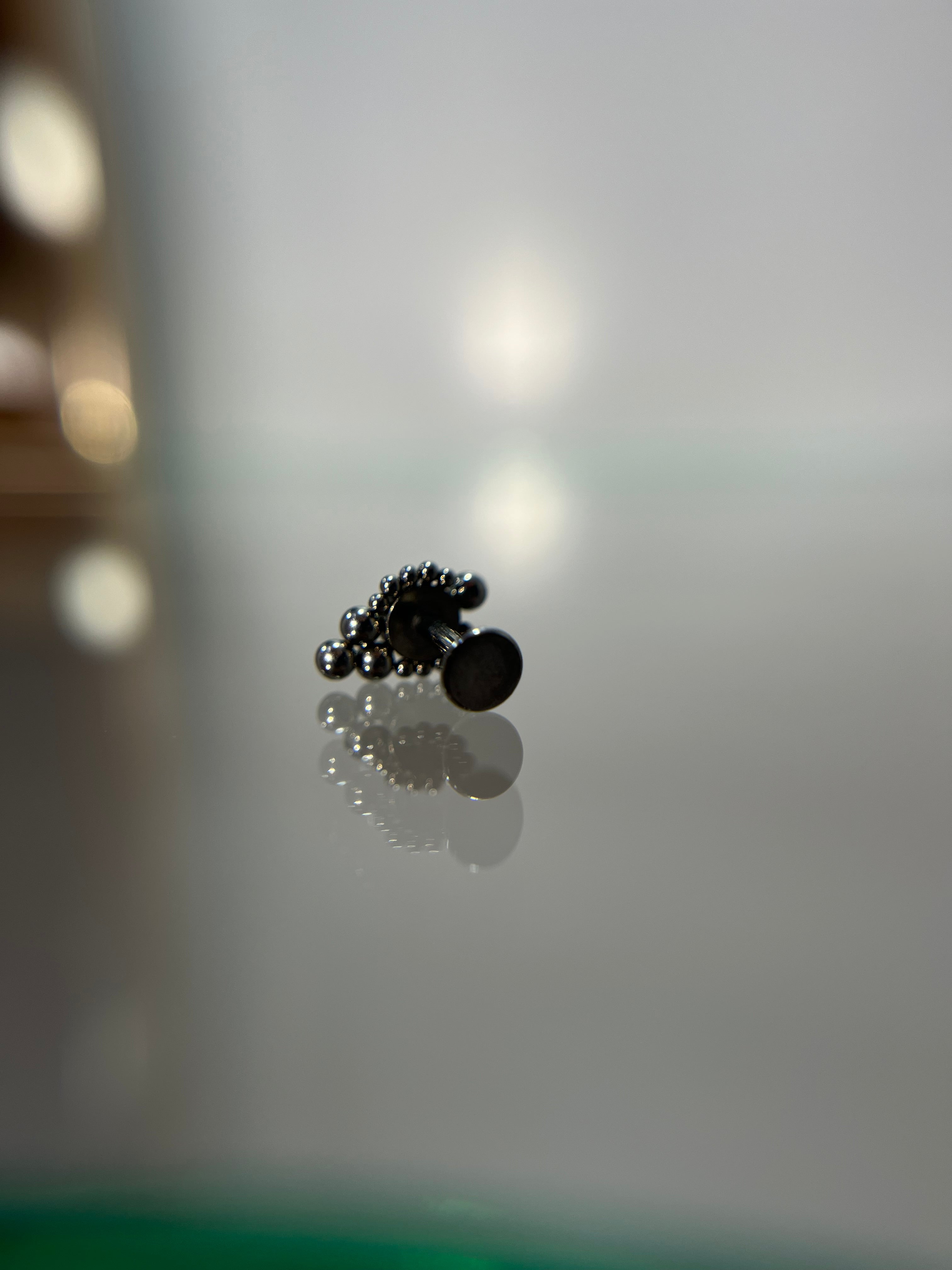 Piercings tornasol (cierre plano)