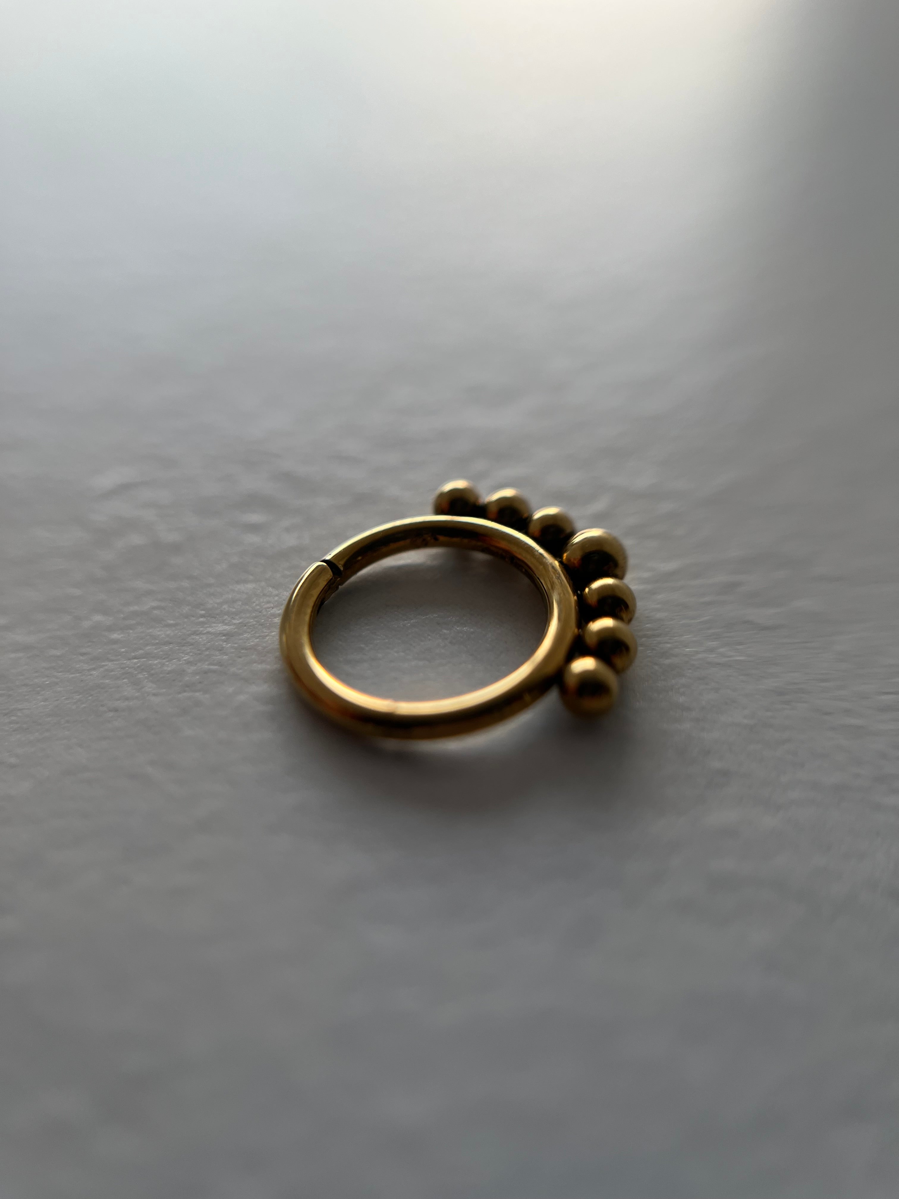 Piercings bolitas
