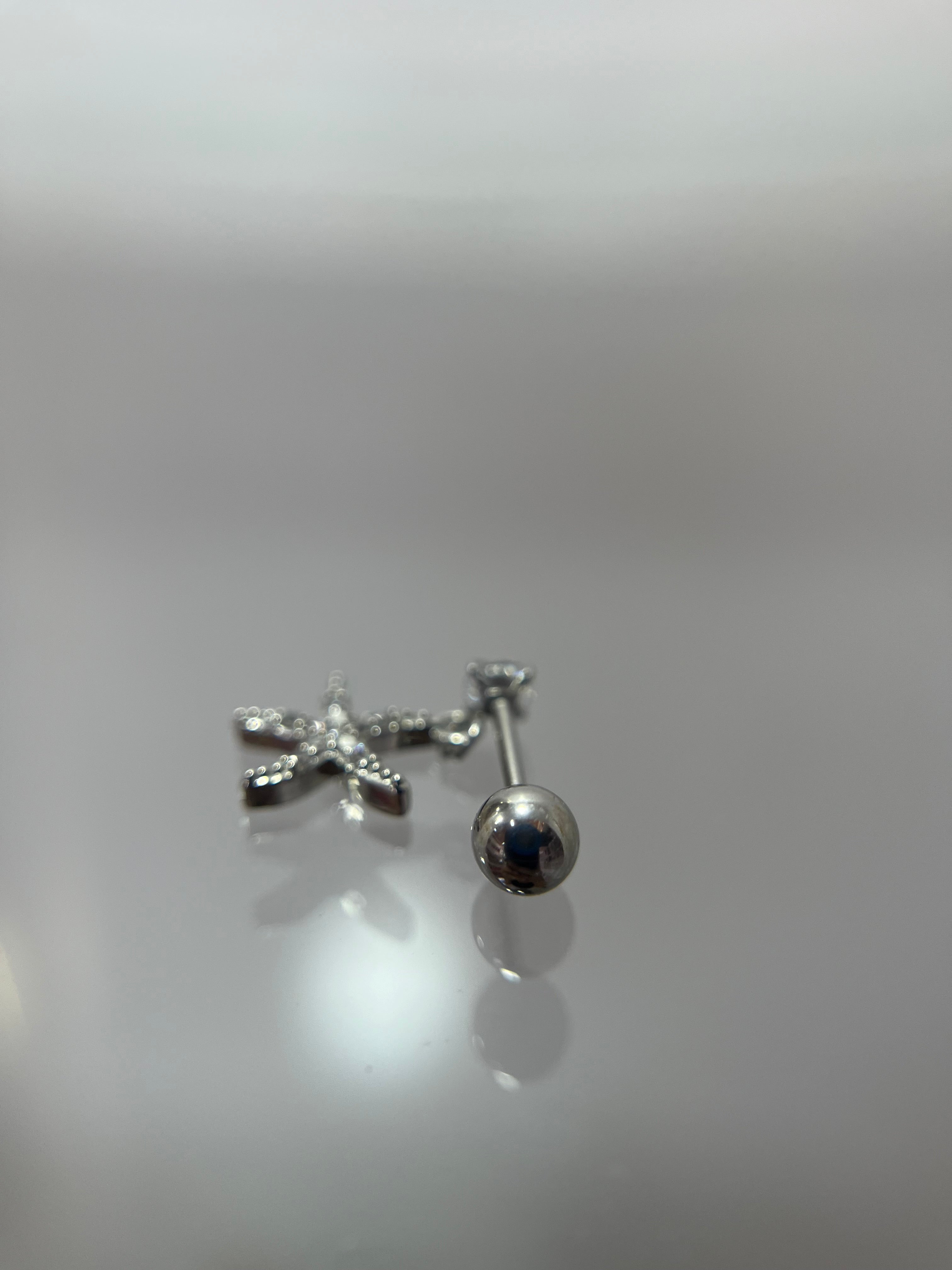 Piercings estrella de mar con diamante (cierre de esfera)