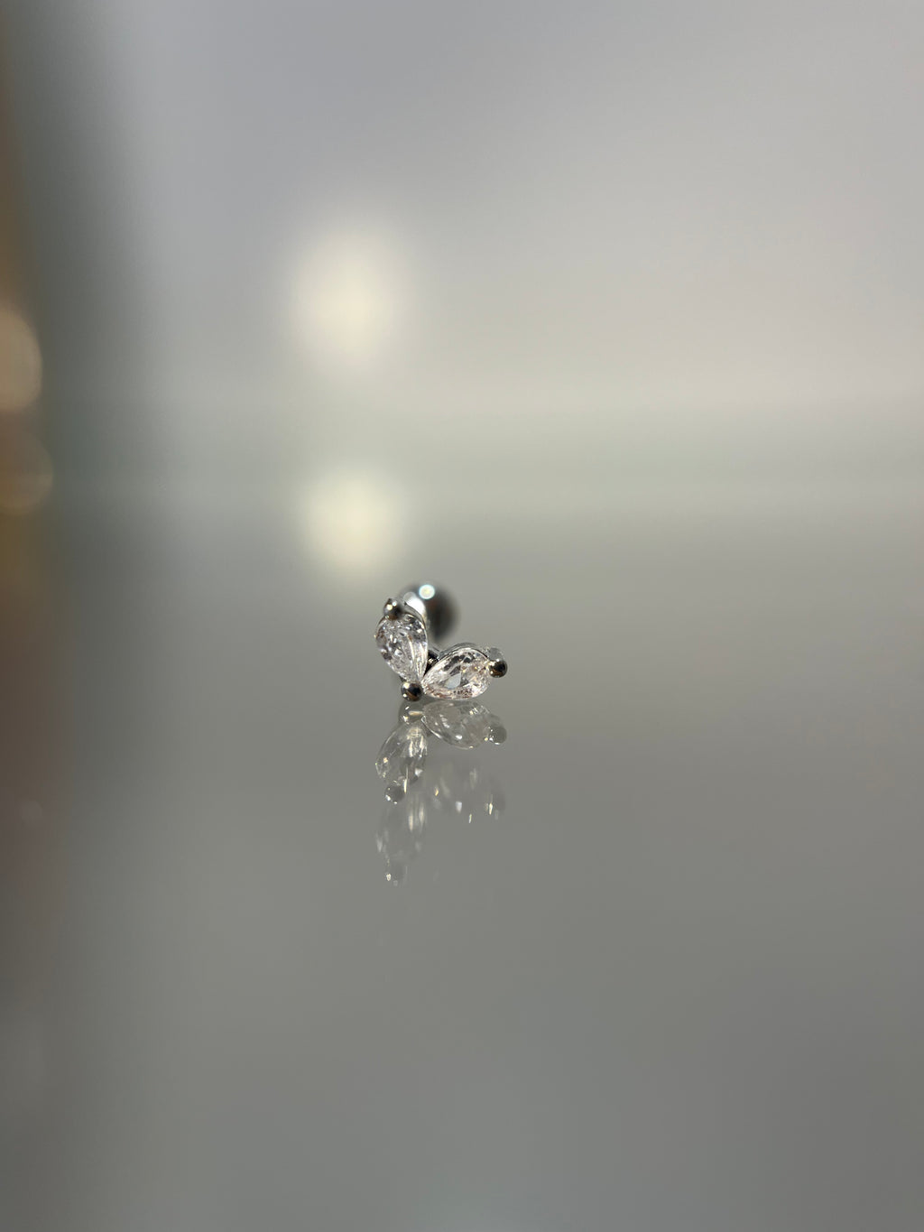 Piercings alitas (cierre esfera)