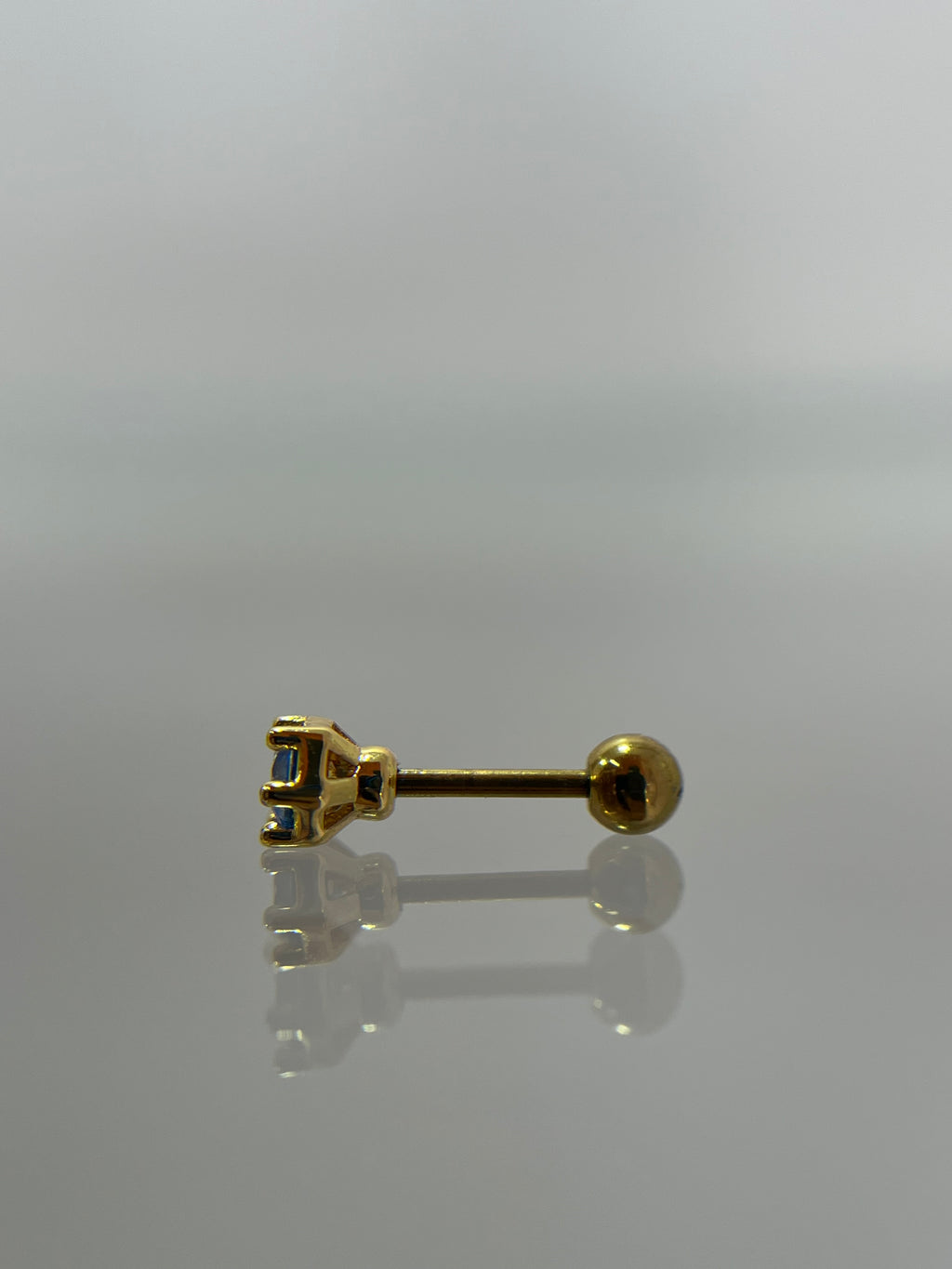 Piercing gema dorado titanium  (cierre bolilla)