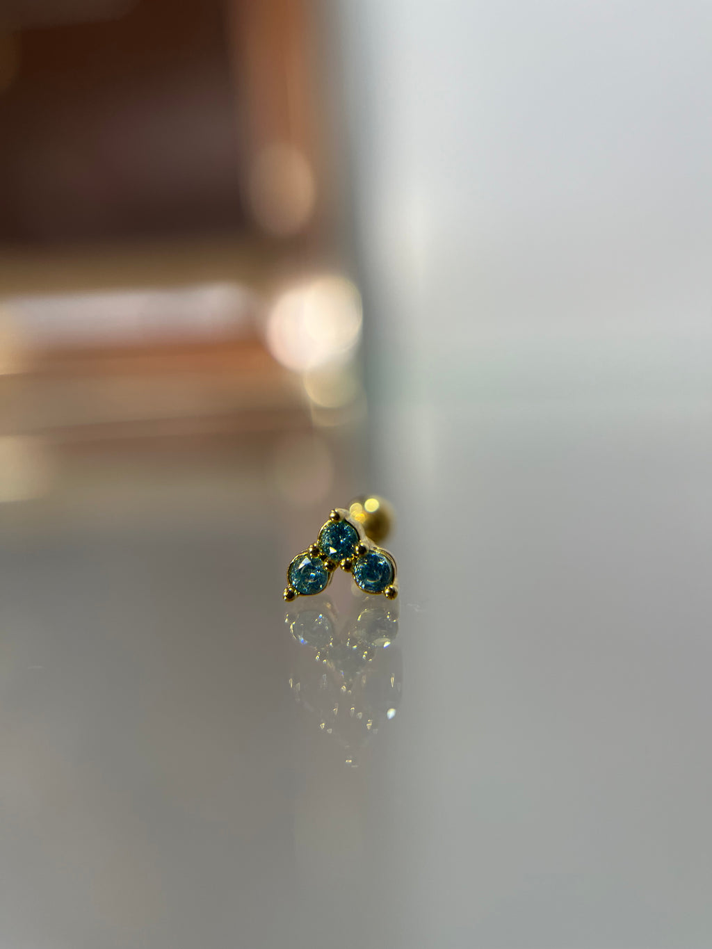 Piercings brillitos celeste (cierre esfera)