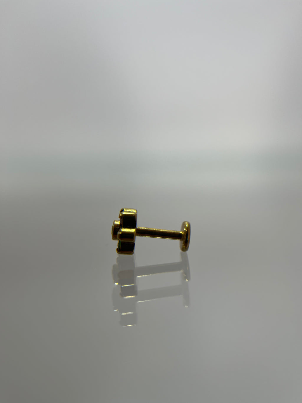 Piercing flor titanium dorado (cierre plano)