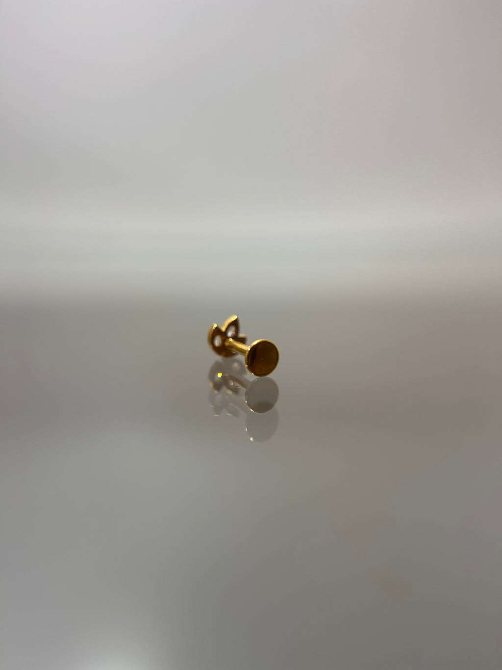 Piercing loto (cierre plano)