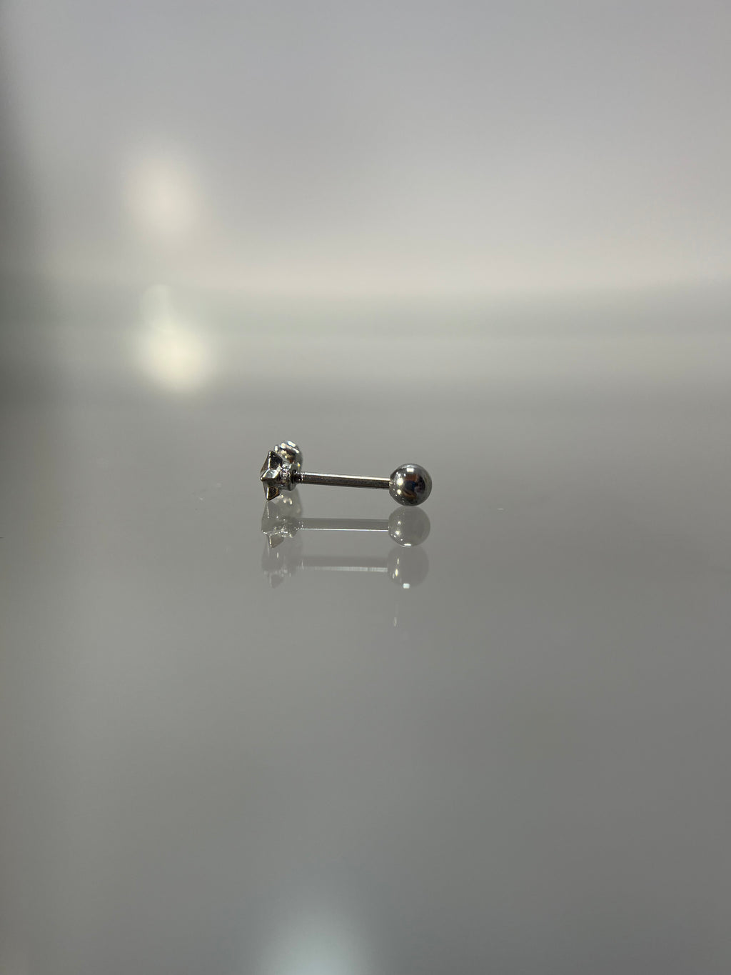 Piercings estrella (cierre esfera)
