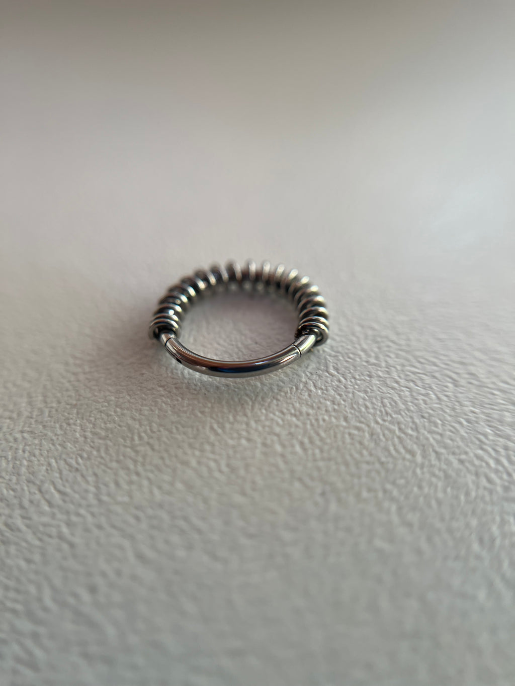 Piercings elástico