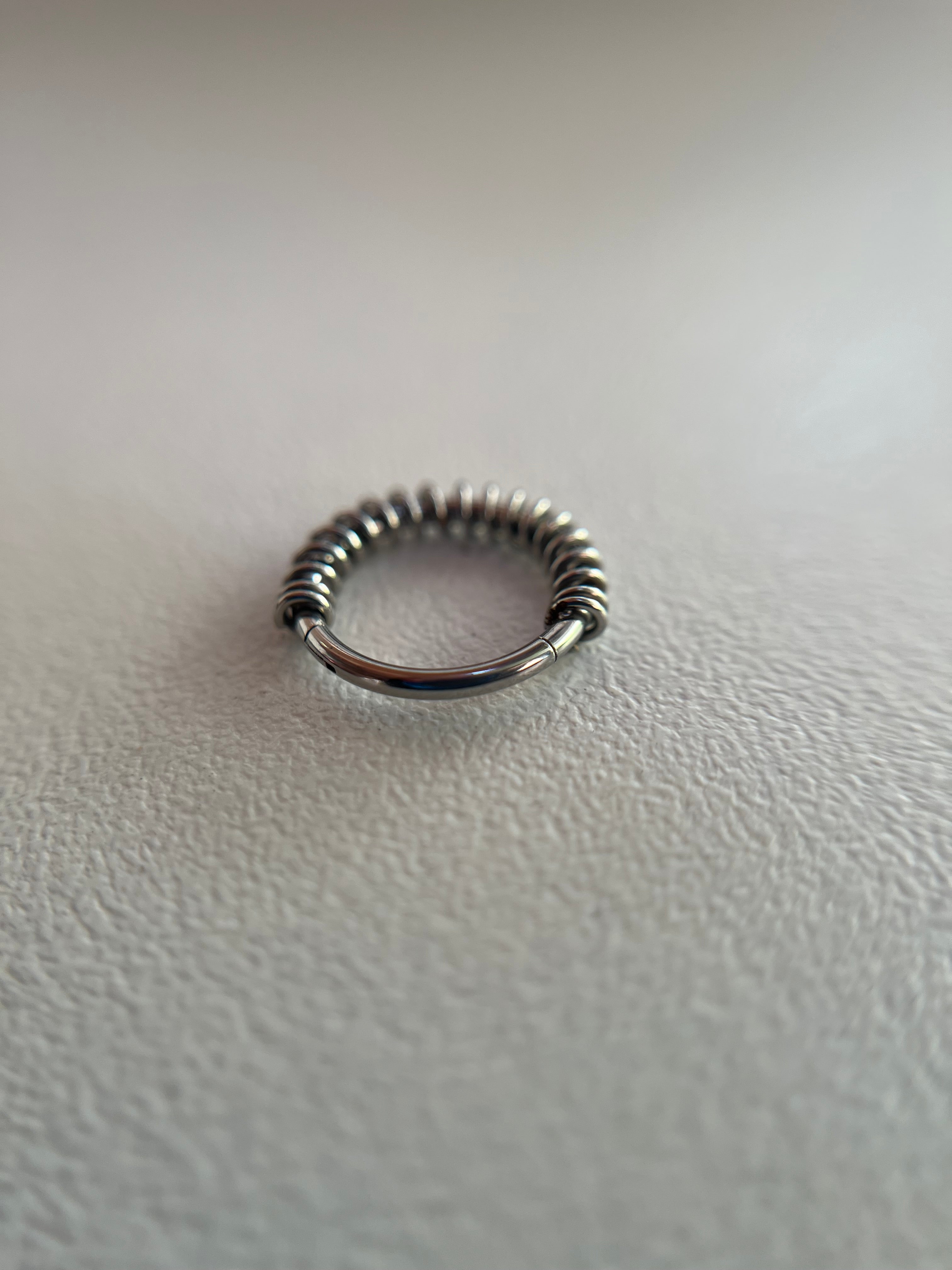 Piercings elástico