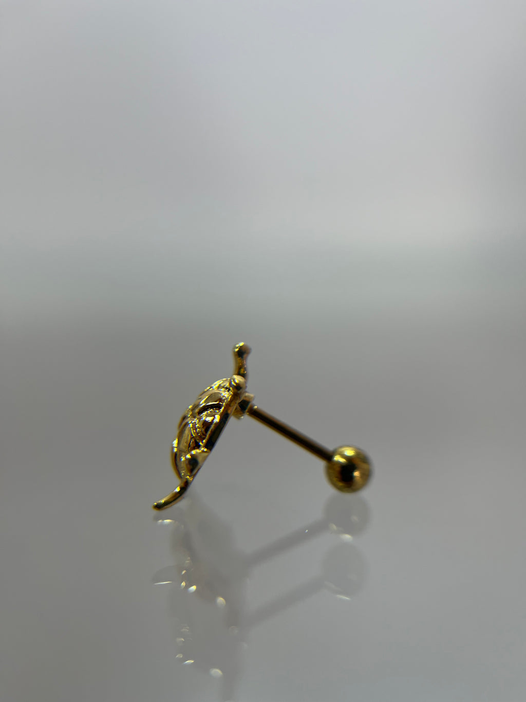 Piercing tortuga titanium dorado (cierre bolilla)