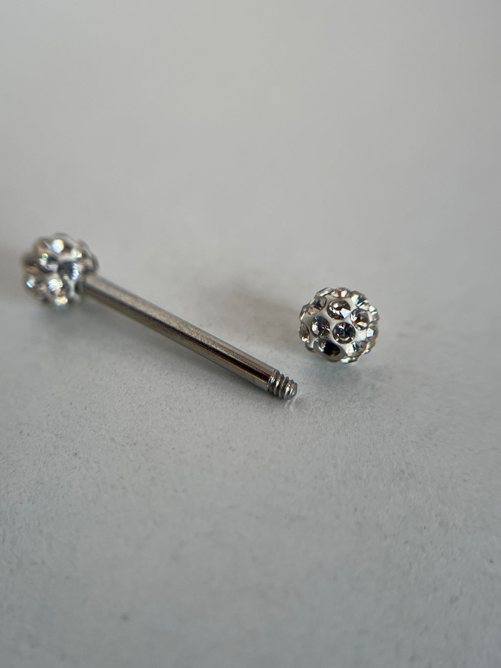 Piercings pezones esfera con cristal incrustado
