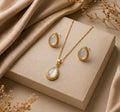 Set collar + aretes dorados