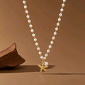 Collar con perlas y estrellas de mar
