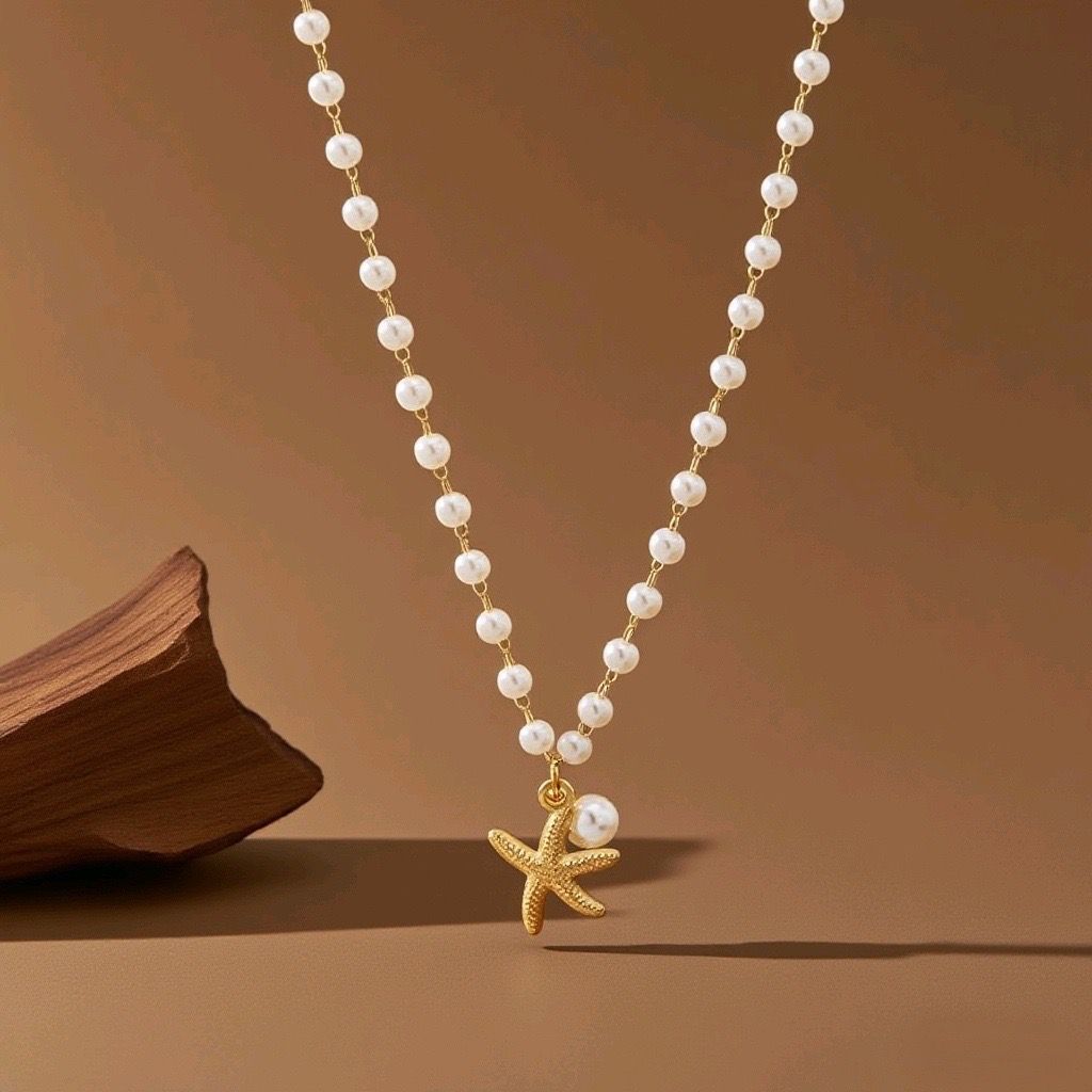 Collar con perlas y estrellas de mar