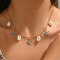 Collar de conchas y estrellas de mar dorado