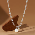 Collar con perla plateado