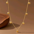 Collar de conchas dorado