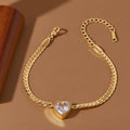 Pulsera de corazón dorada